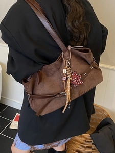 Large vintage brown suede tote bag with leopard heart charm and shoulder strap