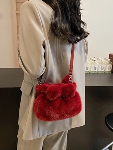 Sac seau bandoulière chic en peluche rouge pour femme avec nœud élégant