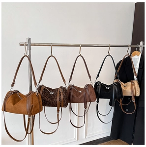 Detailed display of five retro frosted crossbody bags in various colors and leopard print