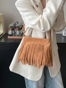 Vintage-Beuteltasche aus Kamel-Wildleder mit langen Fransen und verstellbarem Gurt