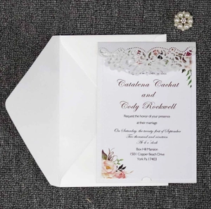 Detailed laser cut lace wedding invitation set with floral print and pearl rhinestone buckle