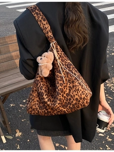 Vintage leopard print canvas tote bag with wide shoulder strap and cute bear charm pendant