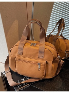 Caramel brown nylon large capacity tote bag with adjustable shoulder strap for travel