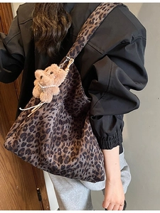 Large leopard print tote bag with plush bear charm, stylish autumn shoulder bag style