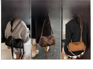 Three leopard print Boston bags showing versatile carrying styles and adjustable straps