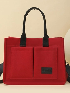Sac cabas en toile rouge avec poches avant et large bandoulière réglable pour femmes