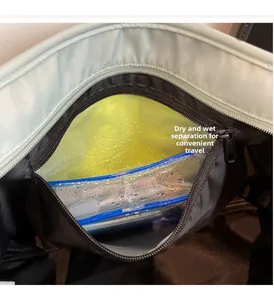 Close-up of internal dry-wet separation compartment with waterproof zipper for travel bag