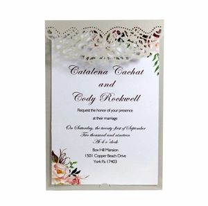 Navy laser-cut floral wedding invitation with champagne lace sleeve and elegant inserts