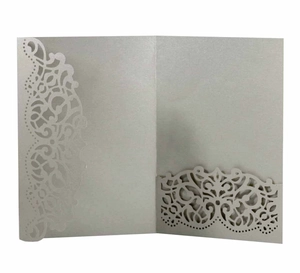Detail view of silver grey laser-cut wedding invitation pocket with pearlescent finish