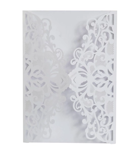 Detailed laser-cut white floral invitation card cover with elegant European patterns
