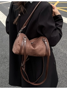 Brown vintage suede hobo bag for women with large capacity and shoulder strap in street view