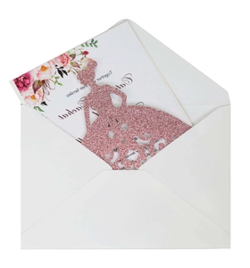 Detail of pink glitter laser-cut invitation with floral card and white envelope