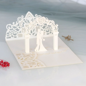 Detailed laser-cut 3D wedding invitation with elegant bride and groom silhouette