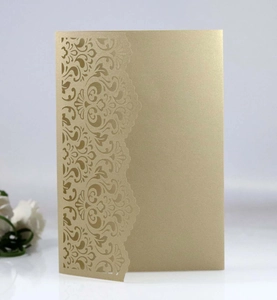 Detailed laser-cut European damascus floral pattern on gold pearlescent invitation card