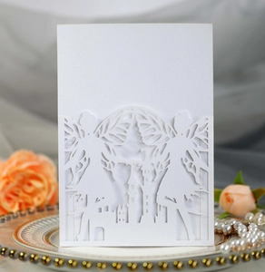 Detailed laser-cut white fairy and castle silhouette with elegant pearlescent texture