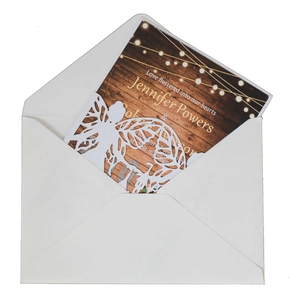 Laser cut wedding invitation set with castle butterfly motif and rustic wood pattern