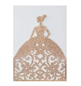 Detailed laser-cut glitter paper wedding invitation featuring a rose gold elegant dress silhouette