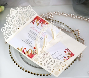 Detailed 3D pop-up wedding invitation with laser-cut lace and autumn leaf design