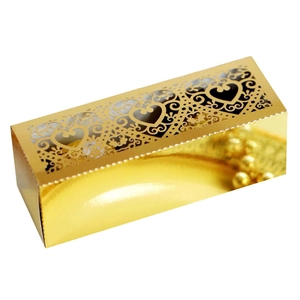 Laser-cut heart pattern on gold foil candy gift box for weddings and celebrations
