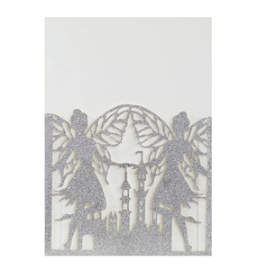 Detail of silver glitter laser-cut card featuring fairy and castle silhouette design