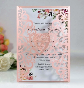 Elegant laser-cut lace wedding invitation card with rose gold hollow heart pattern