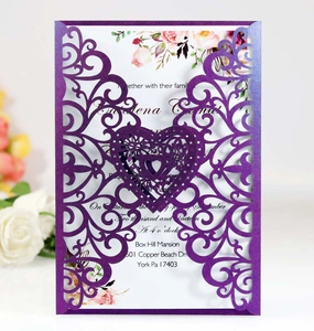 Intricate laser-cut purple heart lace wedding invitation with floral inner card detail
