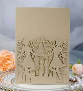 Detailed laser-cut champagne gold castle party invitation card with elegant fairy motifs