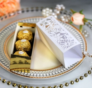 Laser cut hollow wedding candy box with golden tray and white floral lace pattern design