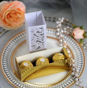 Detailed laser-cut butterfly gift box with gold tray for wedding candy or chocolates
