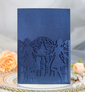 Detailed laser-cut dark blue invitation with fairy and castle motif on pearl paper
