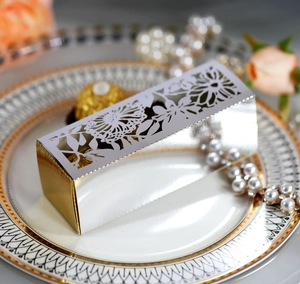 Elegant laser-cut flower gift box with gold and silver finish for wedding candies