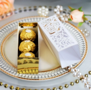 Elegant white laser-cut rose gift box with gold inner tray for chocolates and favors