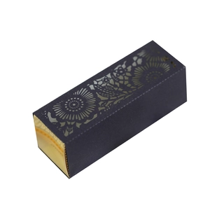 Elegant rectangular laser-cut gift box with floral bird patterns in gold and black