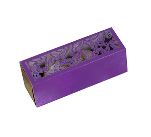 Detailed view of laser-cut butterfly patterns on a purple wedding favor gift box