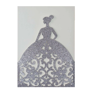 Detail of silver glitter laser-cut wedding invitation featuring a bride silhouette
