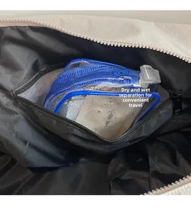 Detail of internal waterproof pocket with blue zipper for dry and wet separation