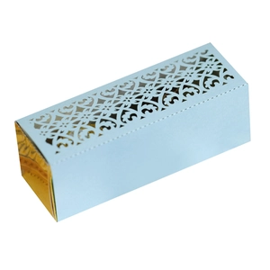 Detail of light blue laser-cut wedding candy box with elegant filigree hollow pattern