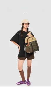 Close-up of lightweight outdoor backpack with mesh pockets and elastic drawstrings