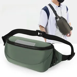 Detail of army green waterproof chest bag featuring reflective strips and buckle