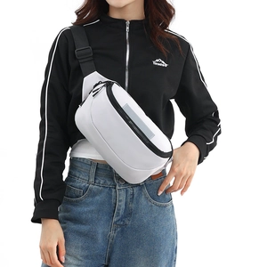 Detail of waterproof crossbody bag showing gray reflective strip and black zipper cord