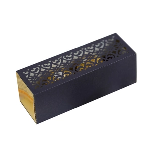 Laser-cut hollow gift box in dark blue with golden lining for wedding and party favors