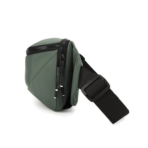 Side view of olive green waterproof crossbody bag showing multiple zip compartments