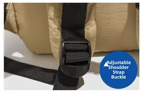 Close-up of adjustable buckle and durable nylon strap on a khaki commute backpack