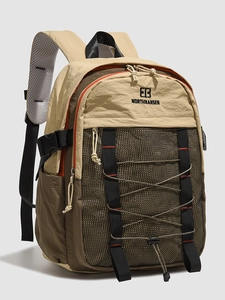 Minimalist large-capacity outdoor backpack with olive green tones and mesh storage system
