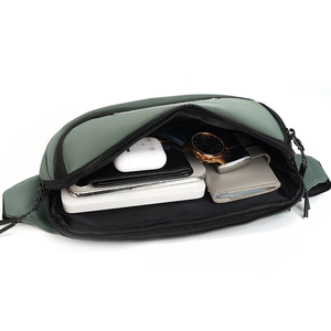 Interior view showing the large storage capacity of the waterproof nylon crossbody bag