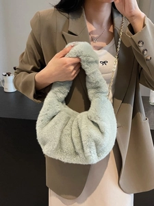 Chic mint green plush chain bag with pleated cloud design and gold hardware