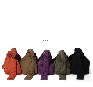 Detailed flat lay of nylon shoulder bags in orange, khaki, purple, green, and black