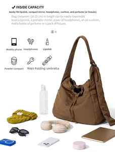 Detail showing the large capacity of the brown nylon drawstring bag with daily essentials