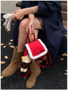 Red mini backpack with white faux fur trim and cute brown teddy bear plush pendant