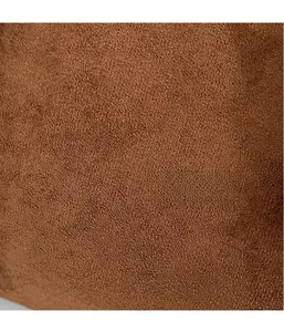 Macro shot of warm brown faux suede texture on a minimalist large capacity tote bag